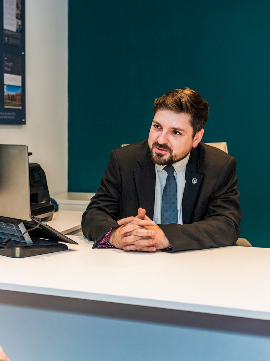 Gleeson Sales Executive talking to customer