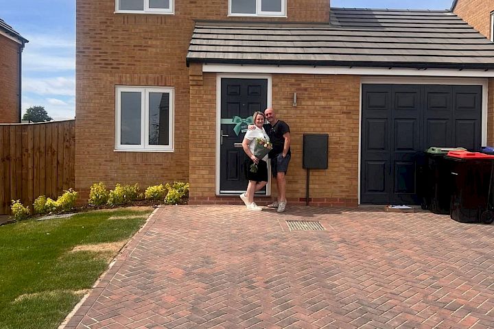 Customers at the front of their home