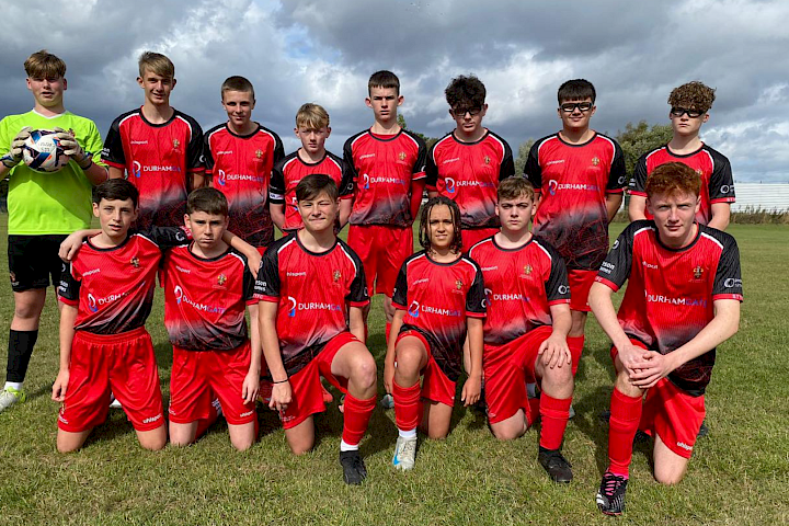 Spennymoor Town Youth FC team photo on a football pitch