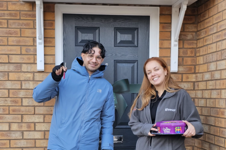 Customers at the front of their home