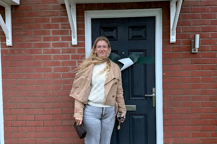 Customer at the front of her home