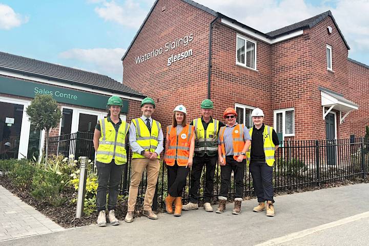 Team stood outside the sales centre