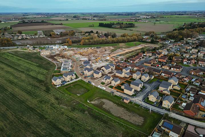 Drone photo of a new build housing estate and fields